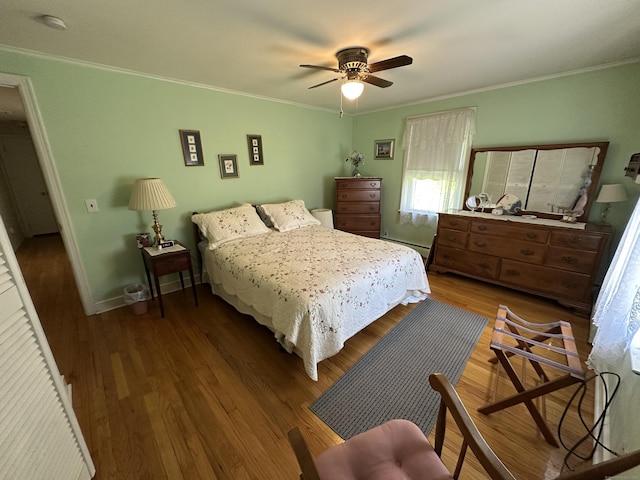 119 Chambers St, Manchester, CT 06042 - bedroom featuring ornamental molding, wood finished floors, baseboard heating, ceiling fan, and baseboards