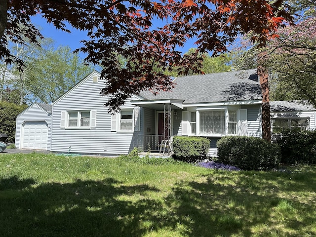 119 Chambers St, Manchester, CT 06042 - view of front facade featuring a front lawn and roof with shingles