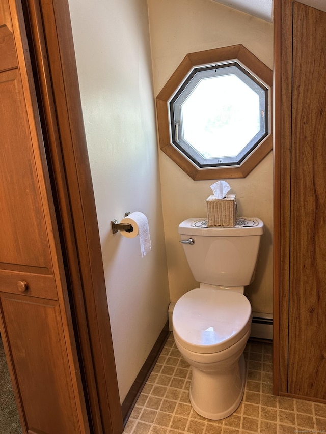 119 Chambers St, Manchester, CT 06042 - bathroom featuring a baseboard heating unit, toilet, and baseboards