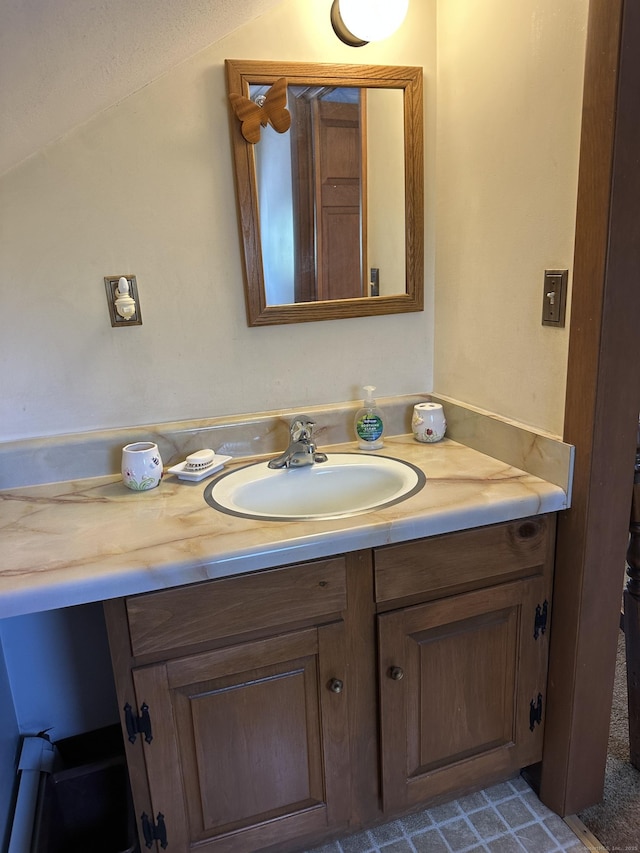 119 Chambers St, Manchester, CT 06042 - bathroom with vanity and lofted ceiling