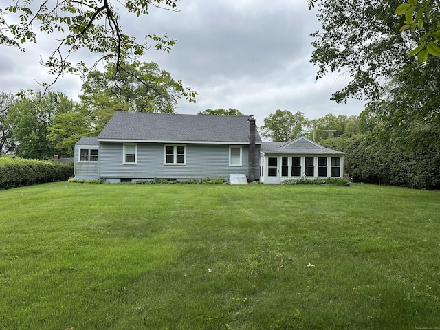 119 Chambers St, Manchester, CT 06042 - rear view of property with a lawn, a chimney, and roof with shingles