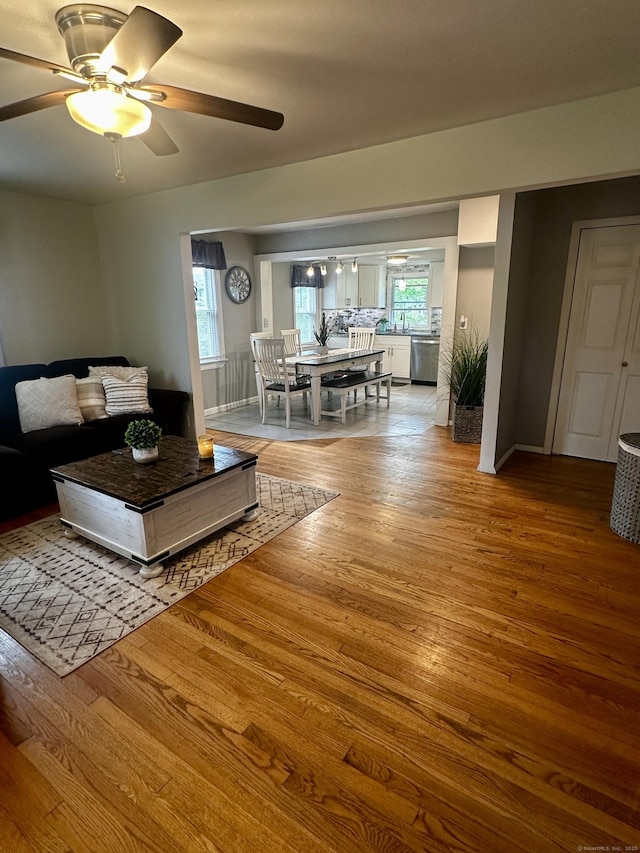140 Clintonville Rd, North Haven, CT 06473 - living area featuring ceiling fan, healthy amount of natural light, and wood finished floors