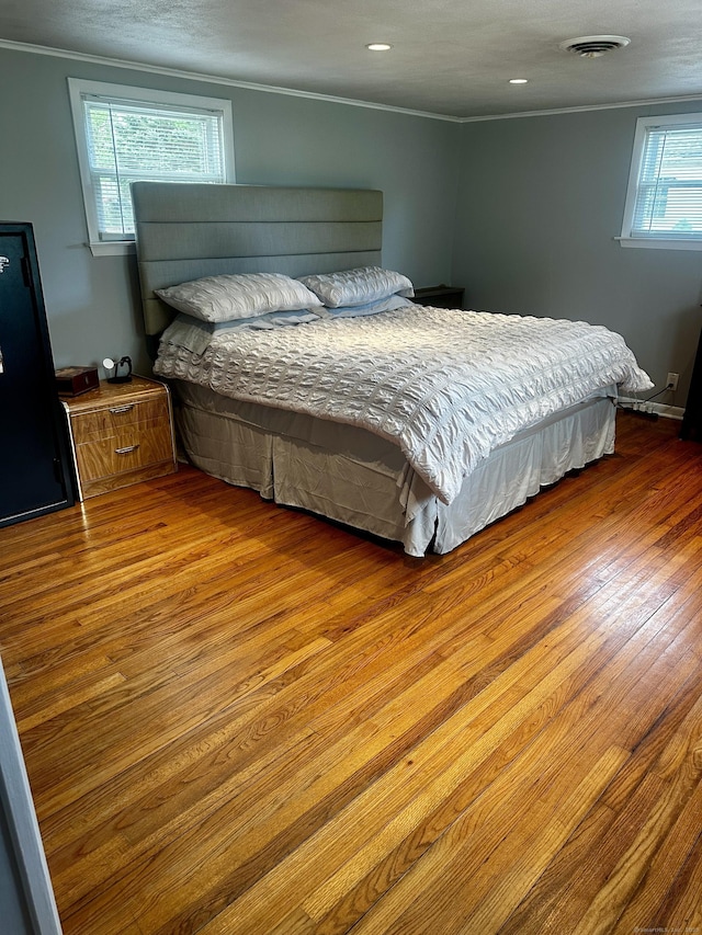 140 Clintonville Rd, North Haven, CT 06473 - bedroom featuring crown molding and wood finished floors