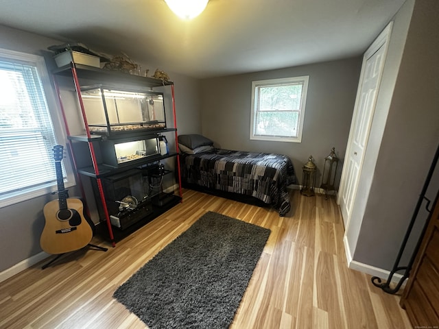 140 Clintonville Rd, North Haven, CT 06473 - bedroom featuring baseboards and wood finished floors