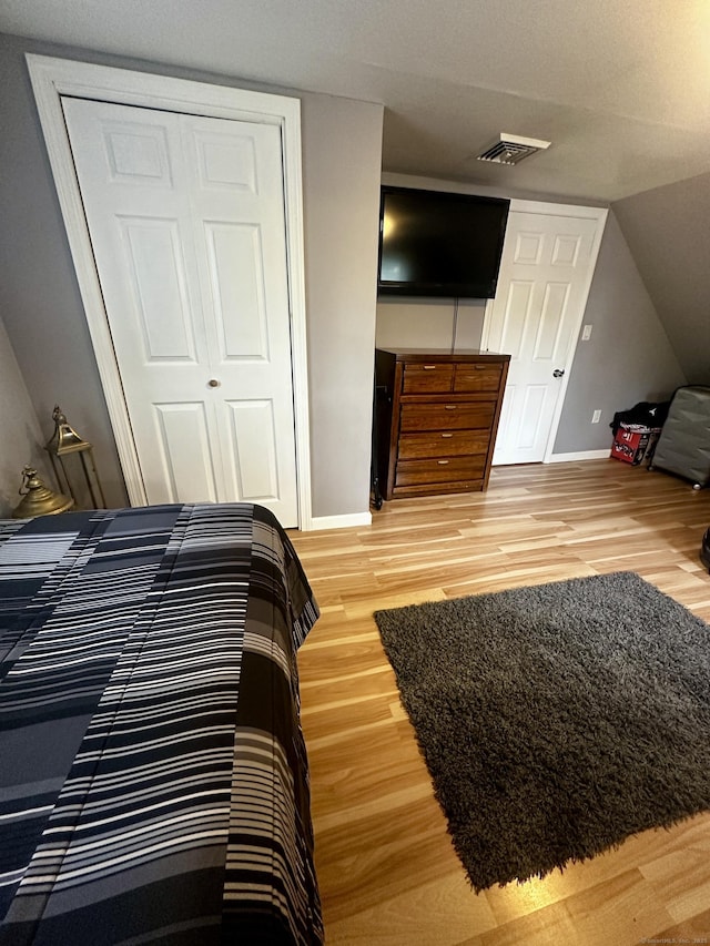 140 Clintonville Rd, North Haven, CT 06473 - bedroom featuring light wood-style floors, baseboards, and a closet