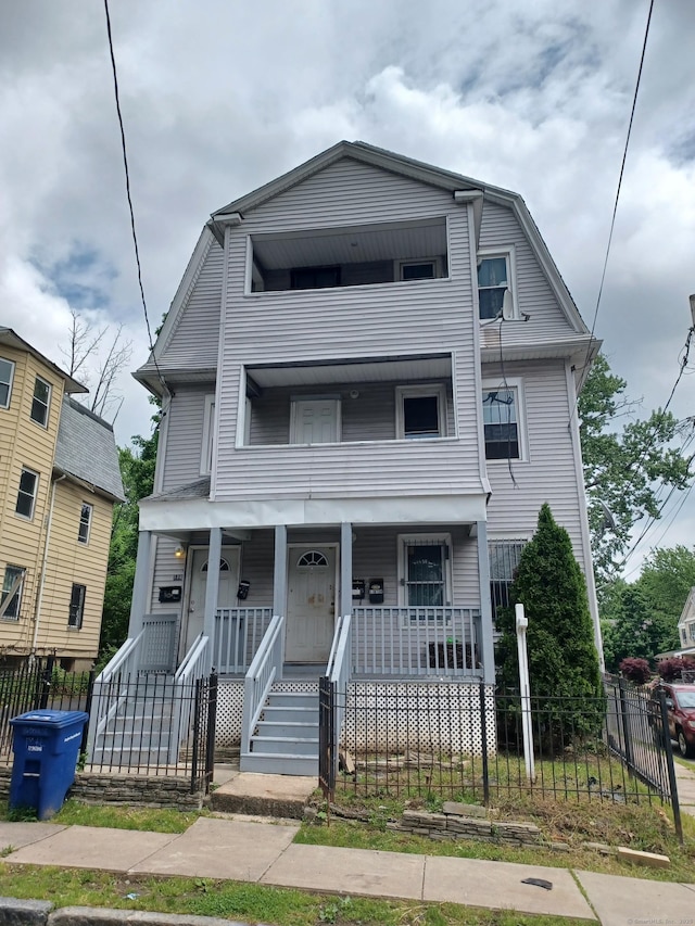 186 Brook St, Hartford, CT 06120 - view of front facade with a balcony and a porch