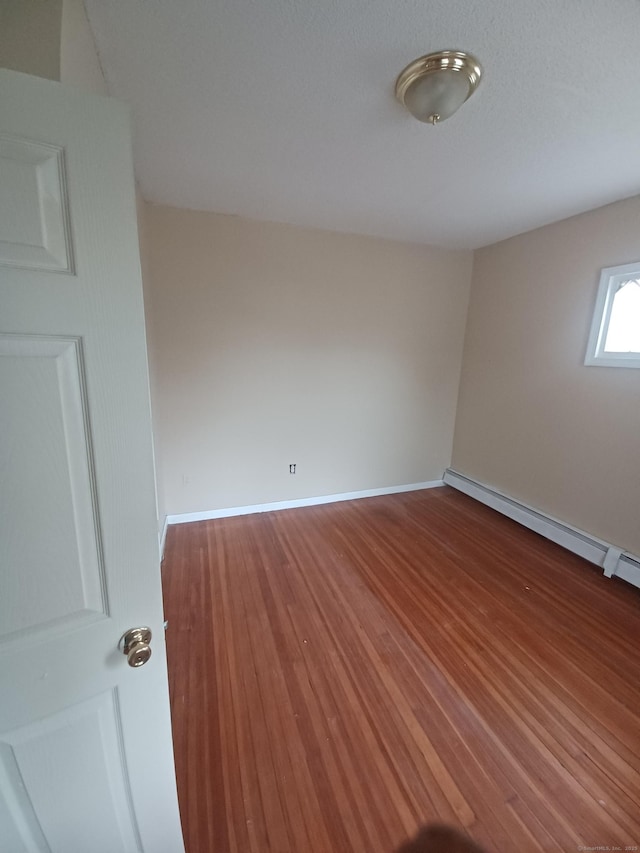 186 Brook St, Hartford, CT 06120 - spare room with wood finished floors and baseboards