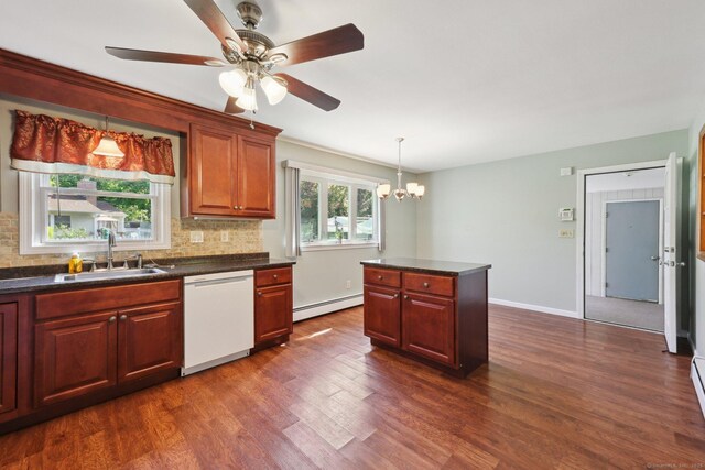 11 Jamestown Rd, Hamden, CT 06518 - kitchen featuring white dishwasher, baseboard heating, a sink, and dark countertops