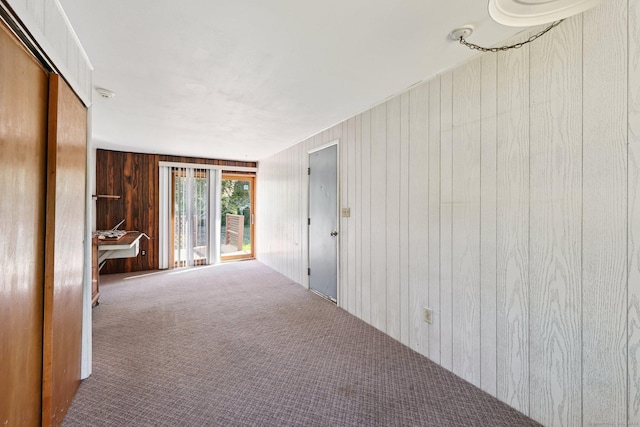 11 Jamestown Rd, Hamden, CT 06518 - corridor with wood walls and carpet