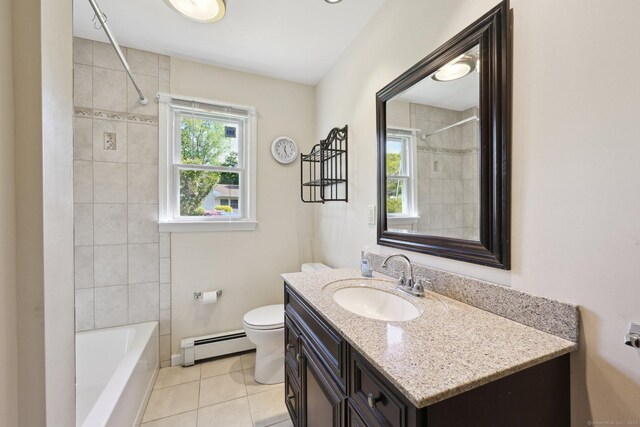 11 Jamestown Rd, Hamden, CT 06518 - full bathroom featuring a baseboard heating unit, tile patterned floors, toilet, vanity, and baseboards
