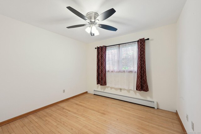 11 Jamestown Rd, Hamden, CT 06518 - empty room with a baseboard radiator, light wood-type flooring, baseboards, and a ceiling fan