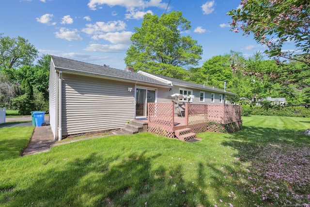 11 Jamestown Rd, Hamden, CT 06518 - rear view of property featuring a lawn, a wooden deck, and a chimney