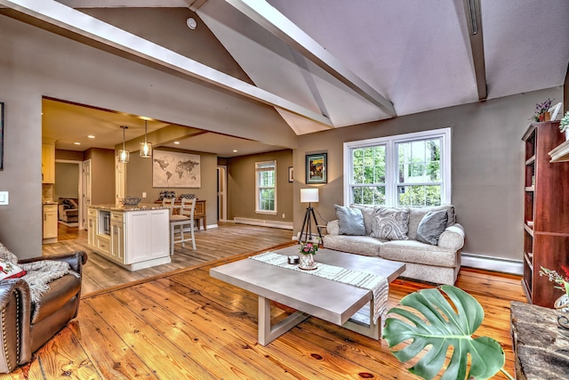 220 Northwood Dr, Guilford, CT 06437 - living room with a baseboard heating unit, baseboard heating, light wood-style flooring, baseboards, and recessed lighting