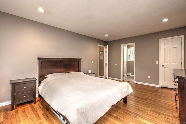 220 Northwood Dr, Guilford, CT 06437 - bedroom with baseboards, light wood finished floors, and recessed lighting