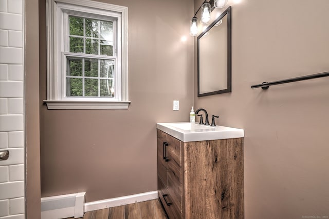 220 Northwood Dr, Guilford, CT 06437 - bathroom with vanity, baseboards, and wood finished floors