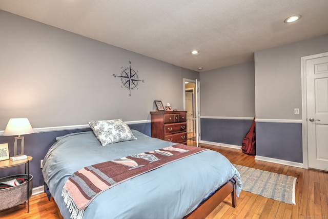 220 Northwood Dr, Guilford, CT 06437 - bedroom with wood-type flooring, recessed lighting, and baseboards