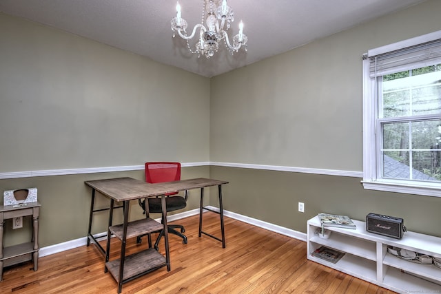 220 Northwood Dr, Guilford, CT 06437 - office area featuring a chandelier, hardwood / wood-style floors, and baseboards