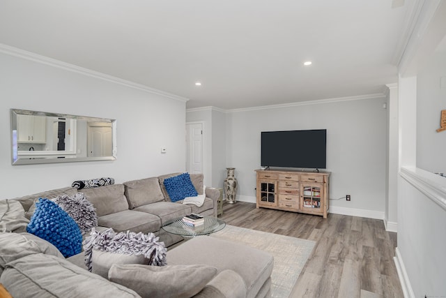 living area featuring wood finished floors, crown molding, recessed lighting, and baseboards
