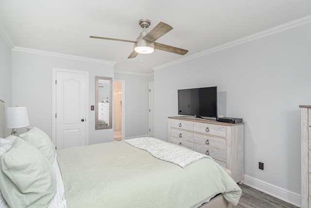 bedroom featuring crown molding, wood finished floors, baseboards, and a ceiling fan