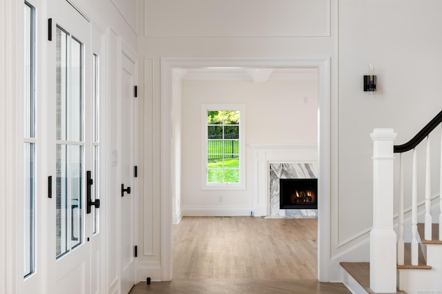 19 Stone Fence Ln, Stamford, CT 06903 - foyer entrance featuring stairs, wood finished floors, and a high end fireplace