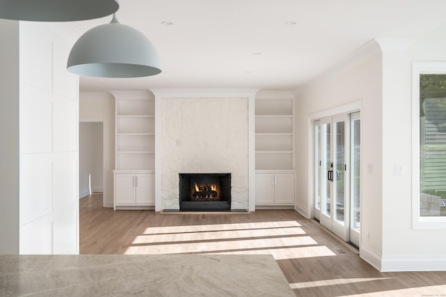 19 Stone Fence Ln, Stamford, CT 06903 - unfurnished living room featuring wood finished floors, a high end fireplace, and baseboards