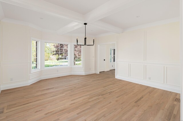 19 Stone Fence Ln, Stamford, CT 06903 - unfurnished dining area with a decorative wall, a chandelier, beam ceiling, and light wood-style flooring