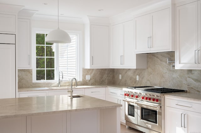 19 Stone Fence Ln, Stamford, CT 06903 - kitchen with double oven range, a sink, white cabinets, and backsplash