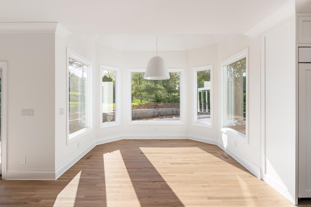 19 Stone Fence Ln, Stamford, CT 06903 - unfurnished sunroom with wood finished floors and baseboards