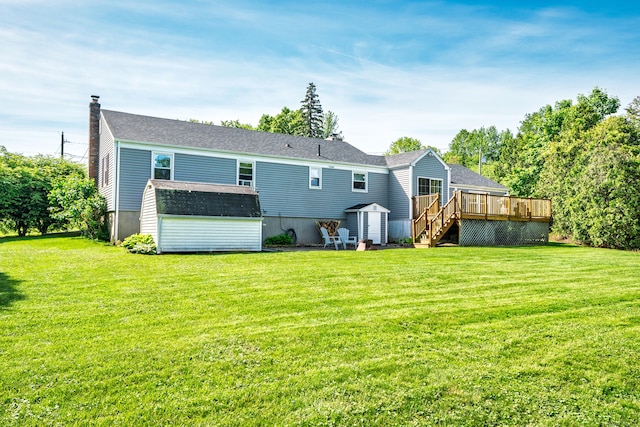 995 Maple St, Wethersfield, CT 06109 - rear view of property with a deck, a chimney, a yard, and stairs