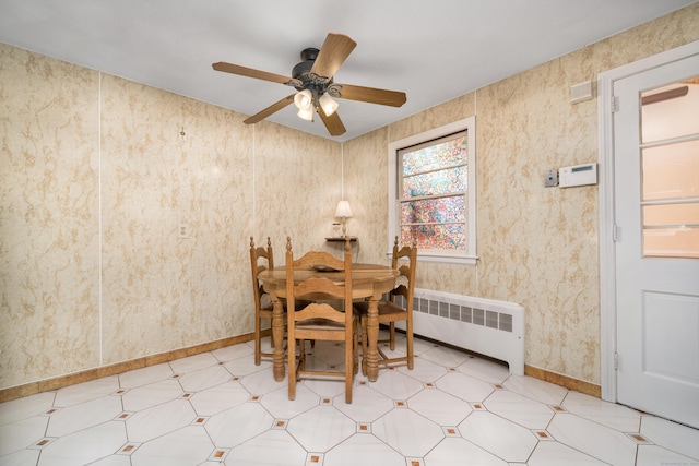 995 Maple St, Wethersfield, CT 06109 - dining space featuring radiator heating unit, light floors, a ceiling fan, and baseboards