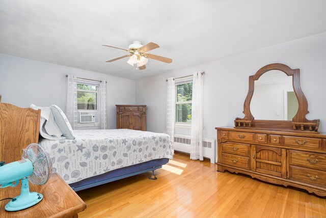 995 Maple St, Wethersfield, CT 06109 - bedroom featuring radiator, light wood finished floors, and a ceiling fan