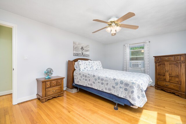 995 Maple St, Wethersfield, CT 06109 - bedroom with light wood finished floors, baseboards, cooling unit, and ceiling fan