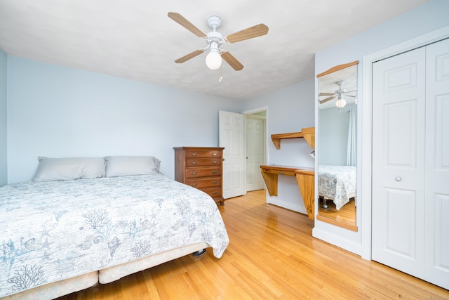 995 Maple St, Wethersfield, CT 06109 - bedroom featuring light wood-type flooring, a ceiling fan, baseboards, and two closets