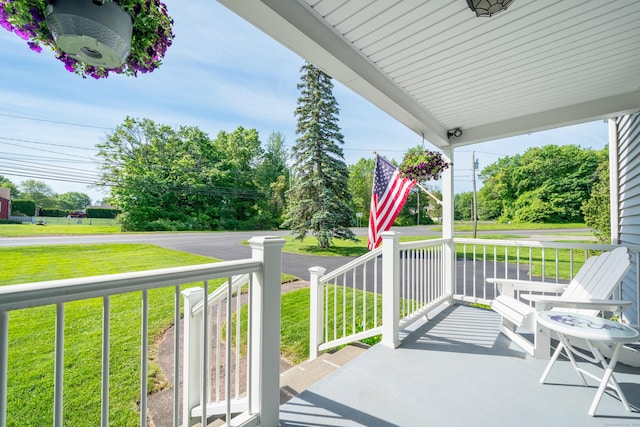 995 Maple St, Wethersfield, CT 06109 - porch featuring a lawn