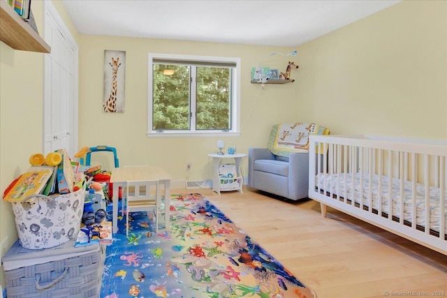 bedroom with wood finished floors