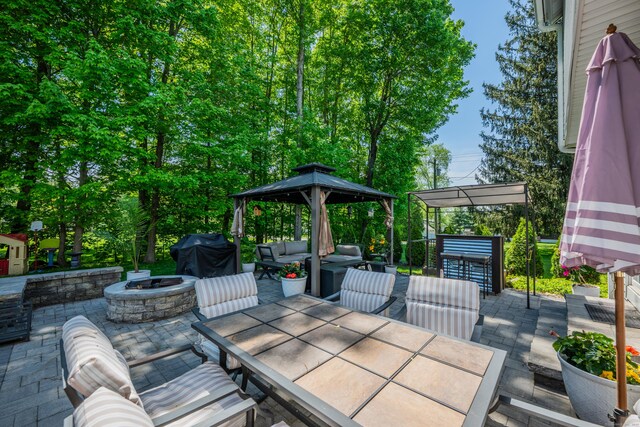 14 Stakey Farm Rd, Southington, CT 06489 - view of patio / terrace with a gazebo, outdoor dining space, area for grilling, and an outdoor living space with a fire pit
