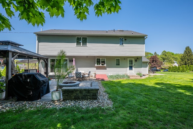 14 Stakey Farm Rd, Southington, CT 06489 - rear view of property with a fire pit, a gazebo, a lawn, and a patio area