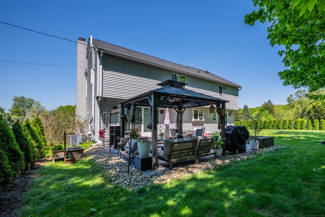 14 Stakey Farm Rd, Southington, CT 06489 - rear view of house featuring an outdoor living space, a gazebo, a chimney, a lawn, and a patio area