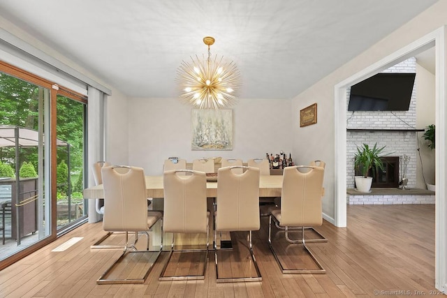 14 Stakey Farm Rd, Southington, CT 06489 - dining space featuring a chandelier, wood-type flooring, and healthy amount of natural light