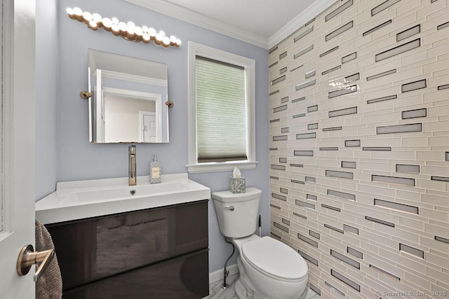 14 Stakey Farm Rd, Southington, CT 06489 - bathroom with toilet, vanity, crown molding, and baseboards