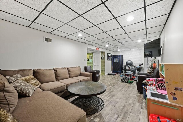 14 Stakey Farm Rd, Southington, CT 06489 - living area with light wood-style floors, recessed lighting, and a drop ceiling