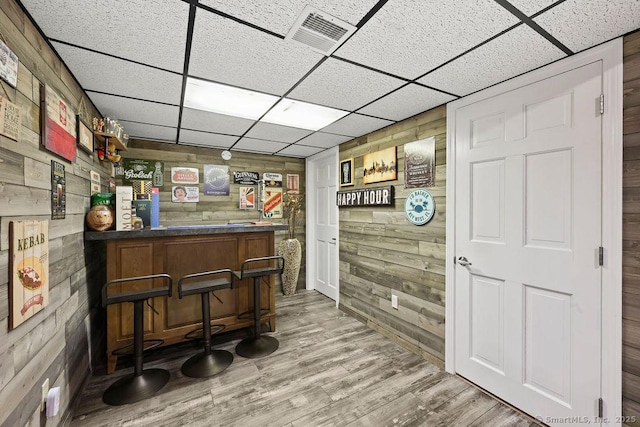 14 Stakey Farm Rd, Southington, CT 06489 - indoor dry bar featuring wood walls, a paneled ceiling, and wood finished floors