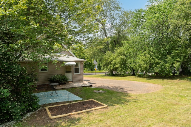 9 Florence St, East Haven, CT 06513 - view of grassy yard featuring a patio