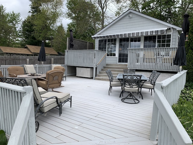 59 Bethlehem Ln, Bethlehem, CT 06751 - deck with outdoor dining area and a sunroom