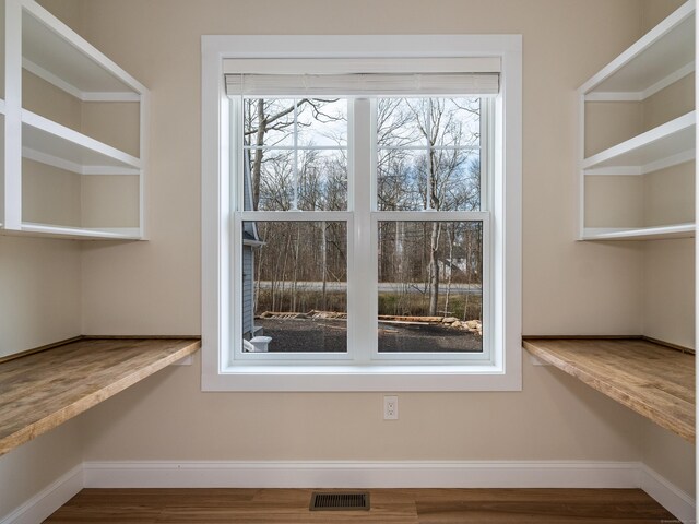 40 Allyn St, Groton, CT 06355 - detailed view of baseboards and wood finished floors