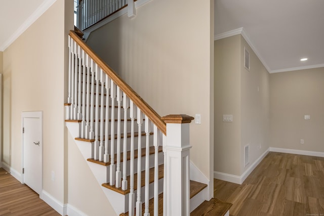 40 Allyn St, Groton, CT 06355 - staircase featuring wood finished floors, ornamental molding, baseboards, and recessed lighting