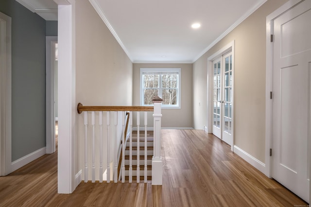 40 Allyn St, Groton, CT 06355 - hallway with wood finished floors, ornamental molding, an upstairs landing, baseboards, and recessed lighting