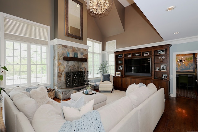 110 Nursery Rd, Ridgefield, CT 06877 - living area with a chandelier, wood finished floors, high vaulted ceiling, and a stone fireplace