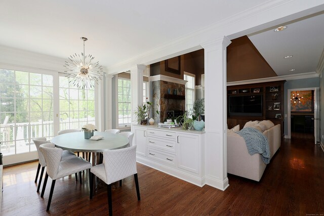110 Nursery Rd, Ridgefield, CT 06877 - dining area featuring a chandelier, dark wood-style floors, crown molding, and recessed lighting
