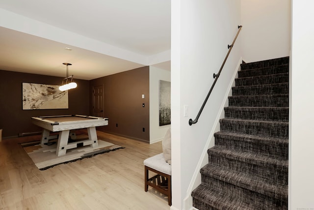 110 Nursery Rd, Ridgefield, CT 06877 - stairs featuring wood finished floors, pool table, and baseboards